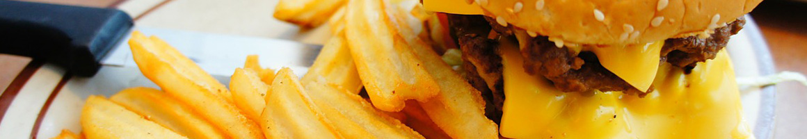 Eating Burger at Nogales Burgers 2 restaurant in Fontana, CA.